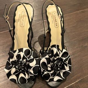 Black and white Coach strappy sandal